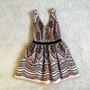 BEBE dress with embroidered lace details